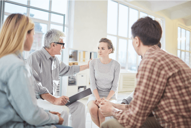 senior employee talking to young employees success institute australia